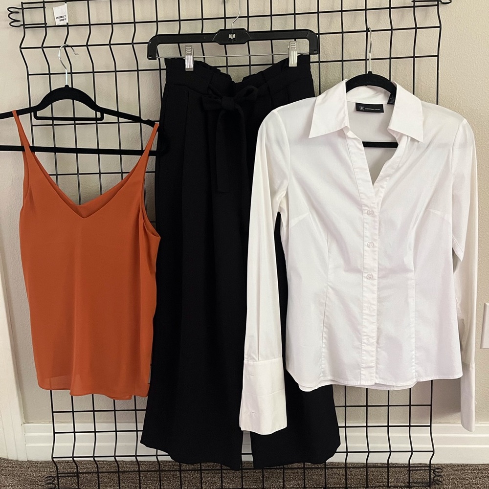 The Perfect white V neck, button down blouse.